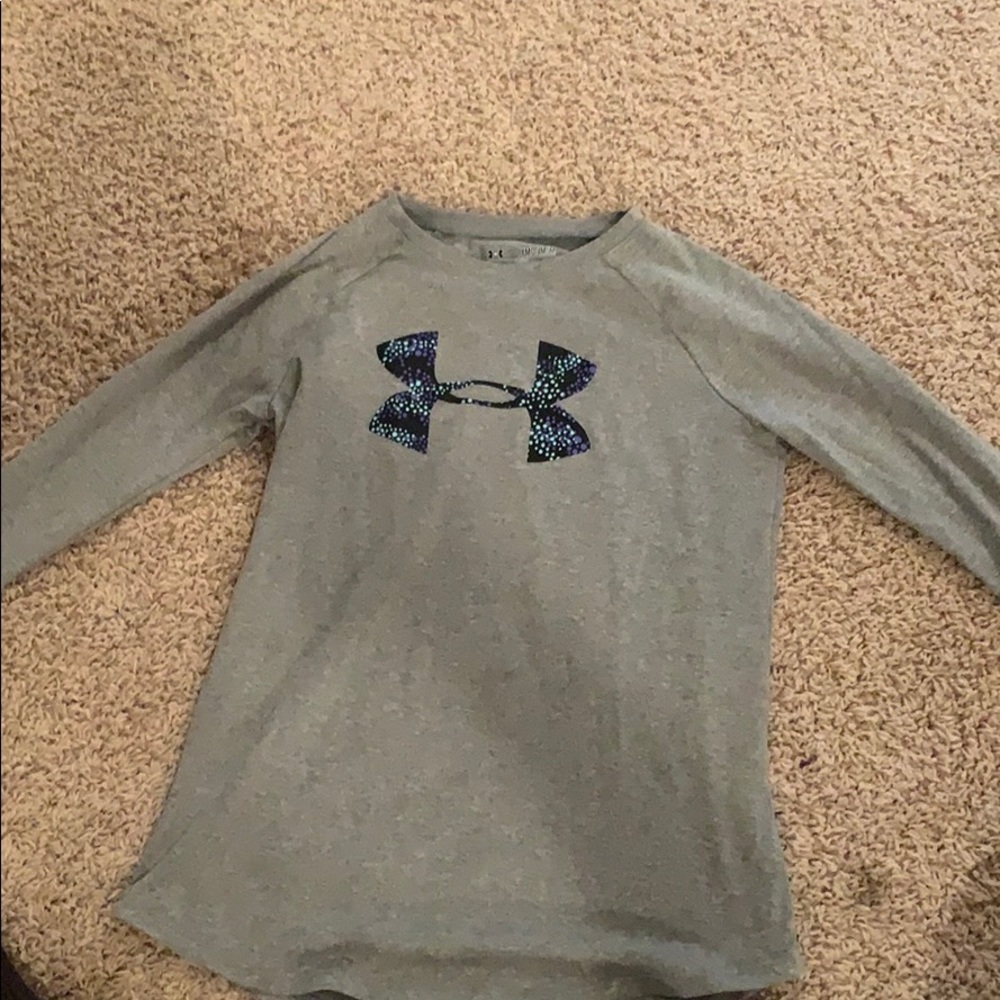 Kids under armour shirt that is grey, purple, blue